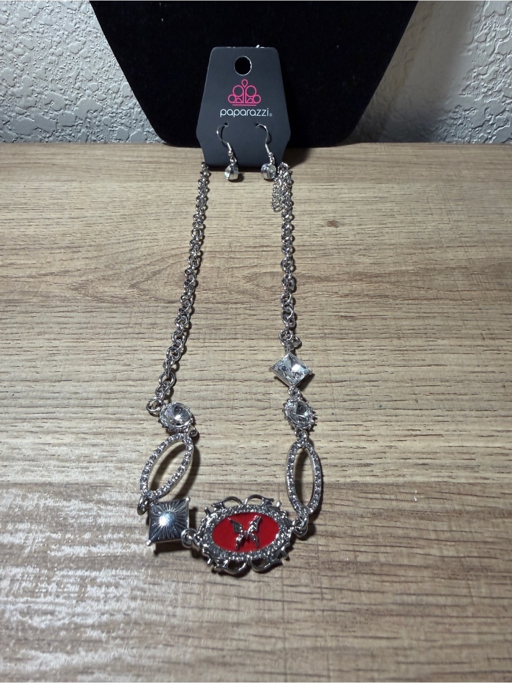 Paparazzi Silver-Tone Necklace with Red Center Emblem